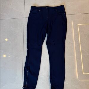 White House Black Market “The Skinny Ankle” pants in navy blue.